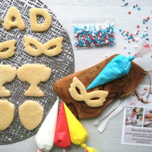 undecorated Father's Day biscuits for dad with royal icing and sprinkles in a DIY Cookie decorating kit
